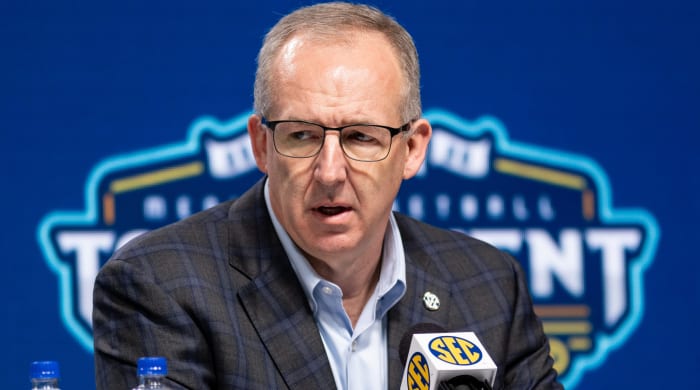Greg Sankey talks to the media.
